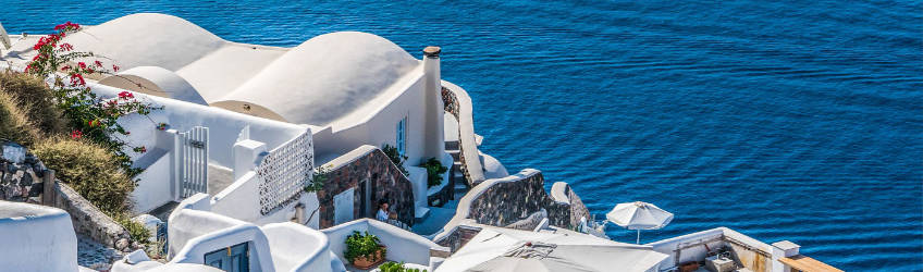  White painted houses and ocean view on Santorini, Greece